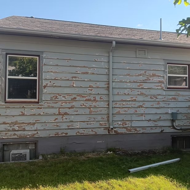 Weathered siding before painting