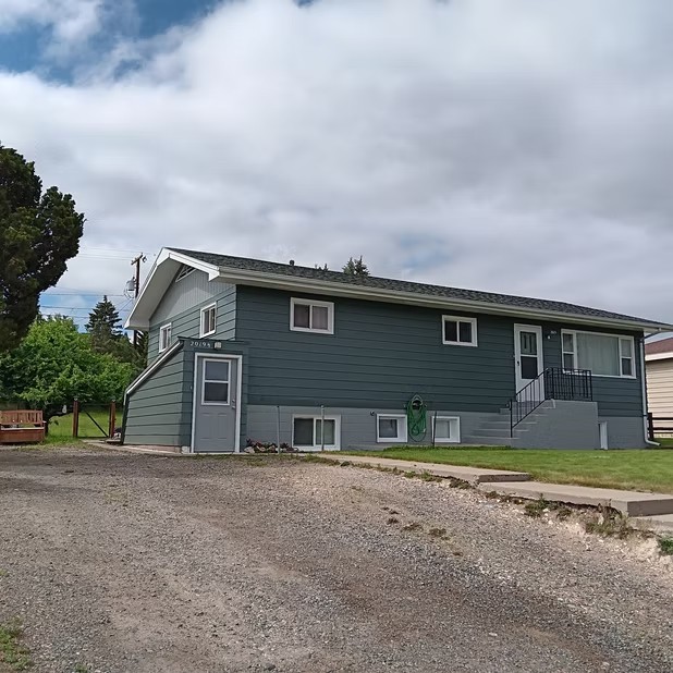 Green two-story home exterior